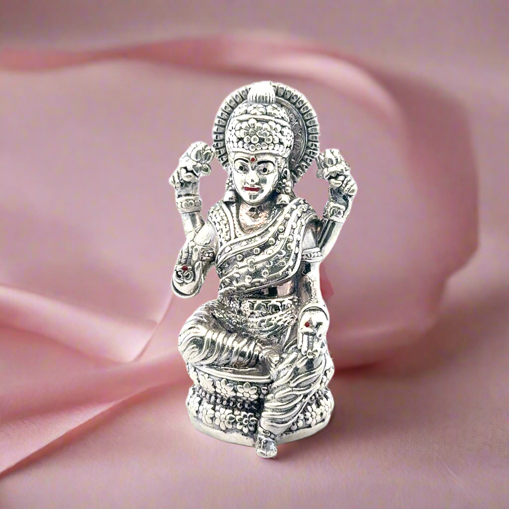 Intricate Silver Statue of a Deity