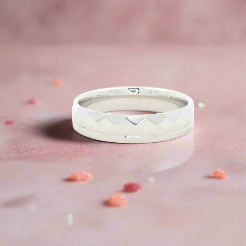 Silver Ring with Faceted Design