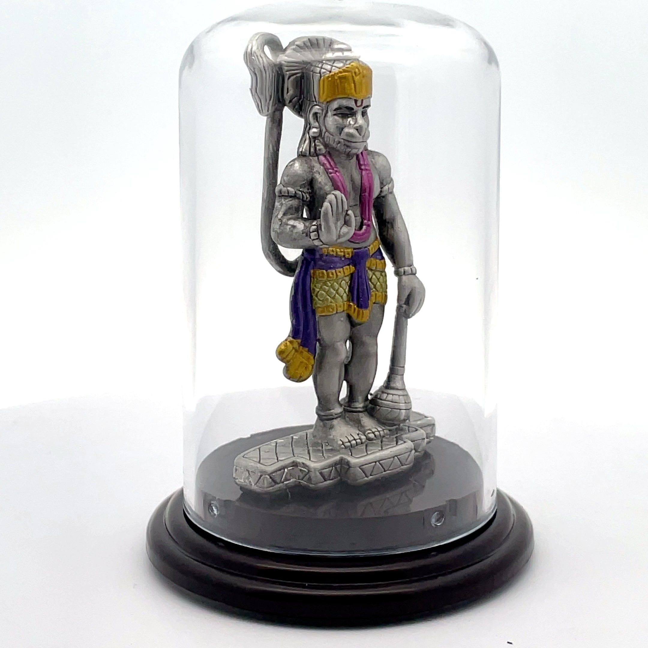 Colorful Hanuman Figurine Under Glass