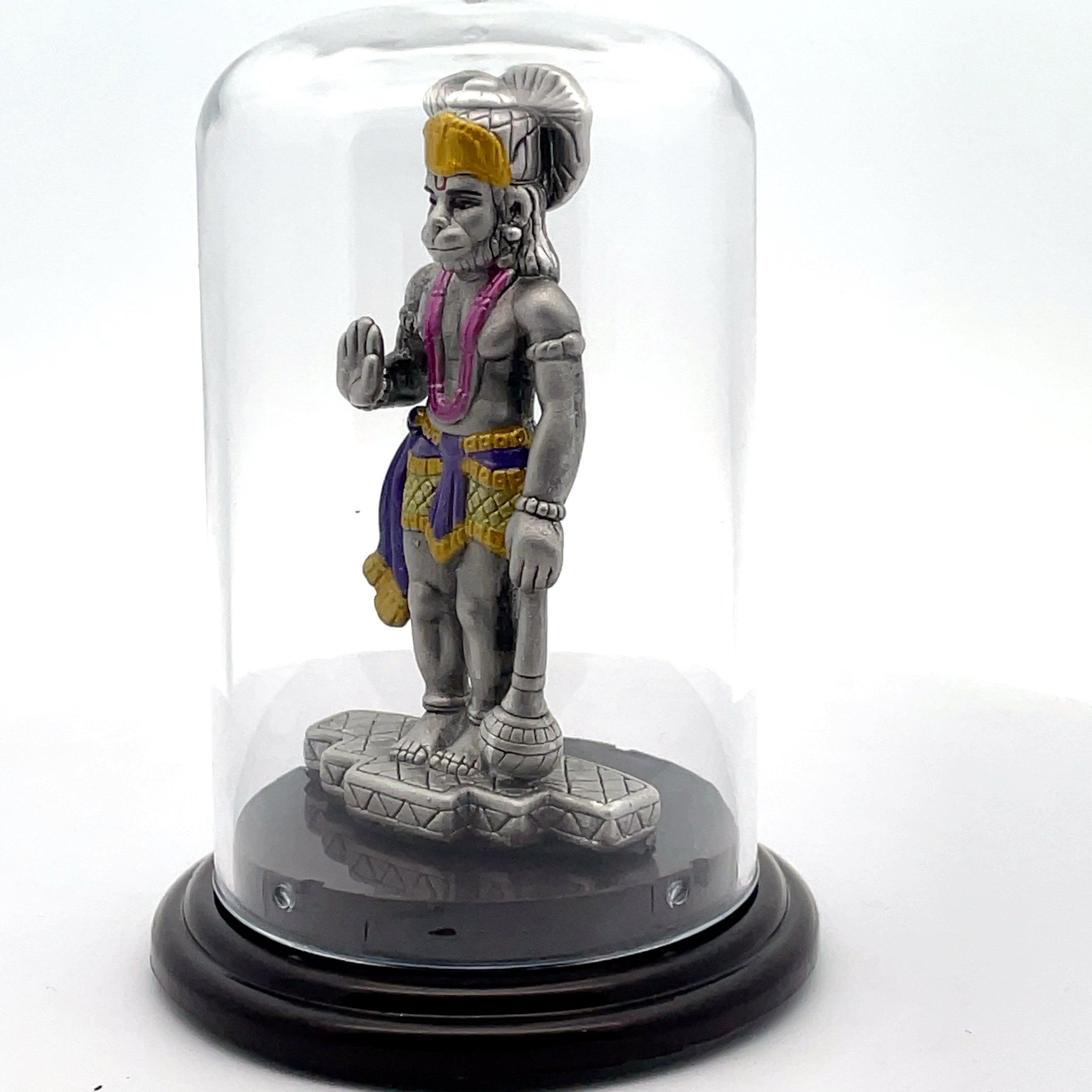 Colorful Hanuman Figurine Under Glass