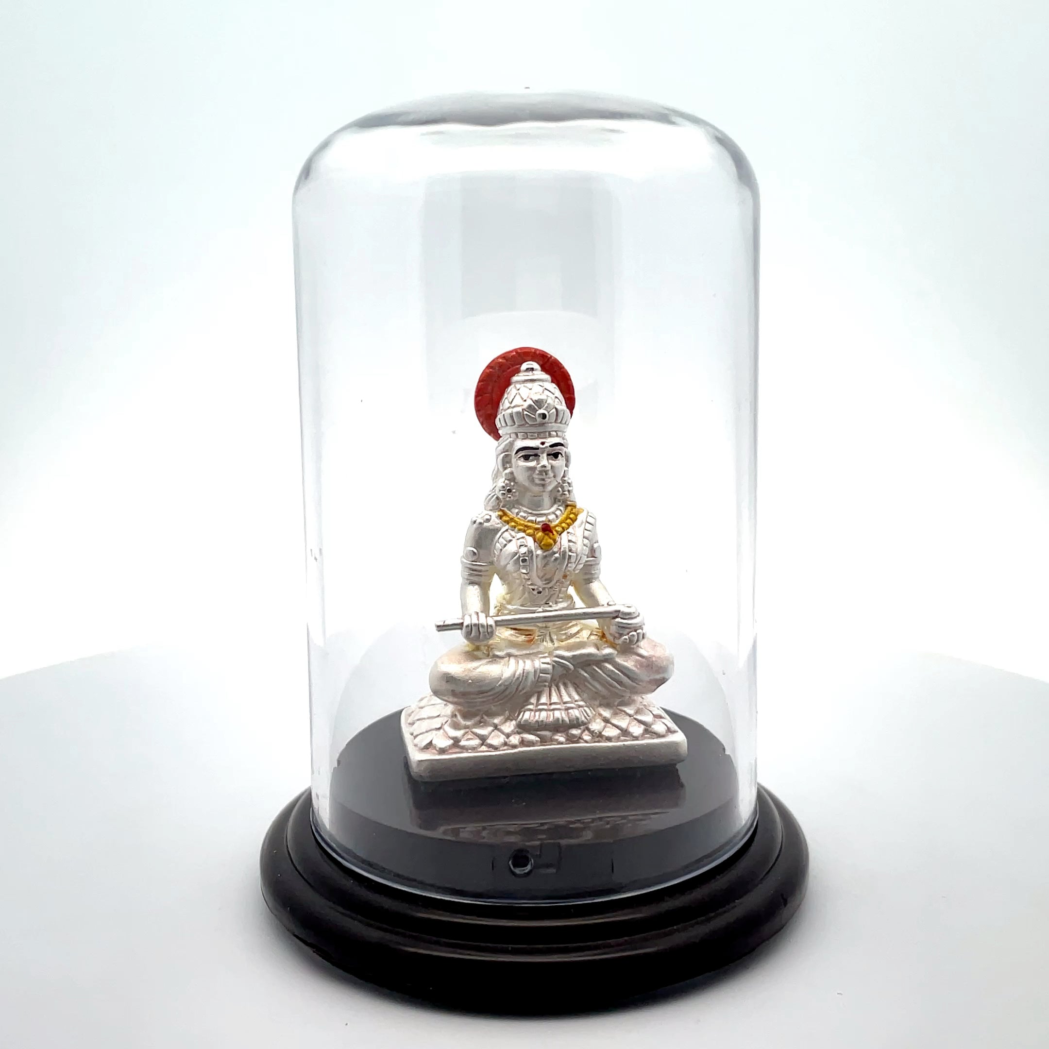 Elegant Silver Annapoorneshwari Figurine in Glass Dome