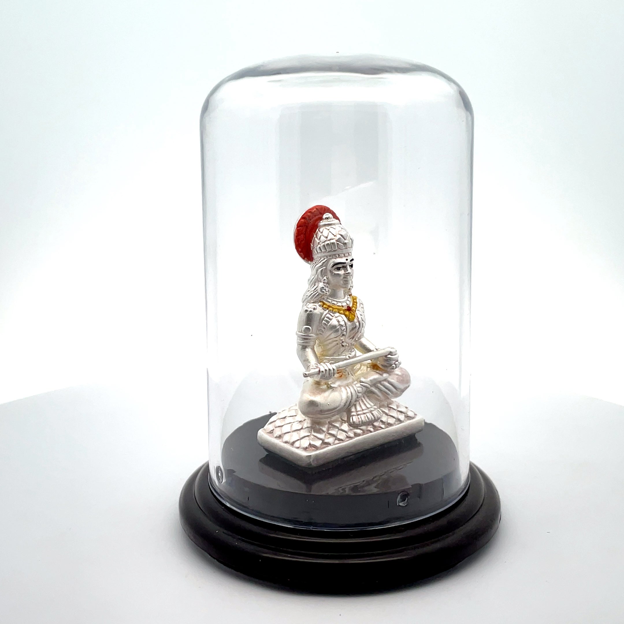 Elegant Silver Annapoorneshwari Figurine in Glass Dome
