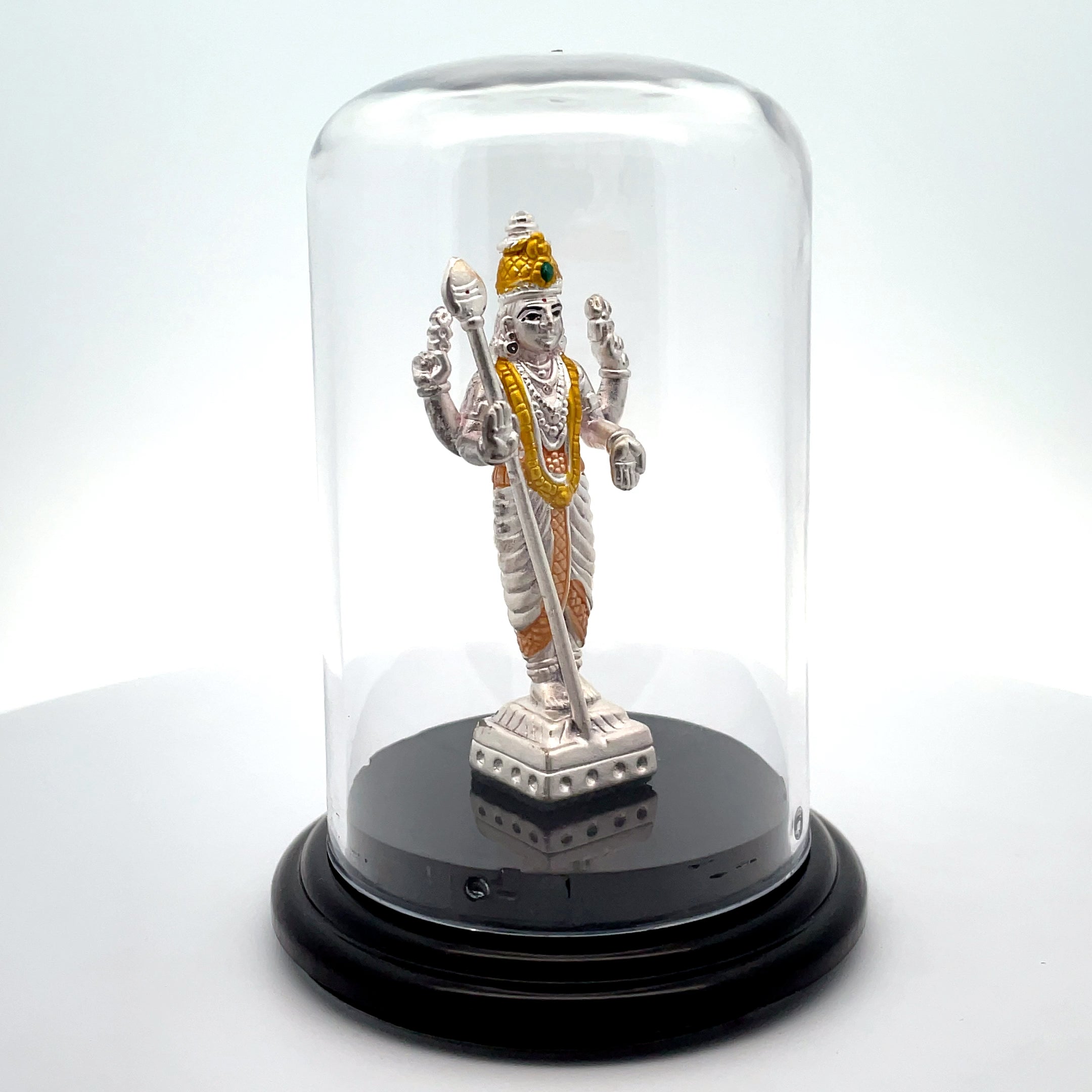 Elegant Silver Murugan Statue Under Glass