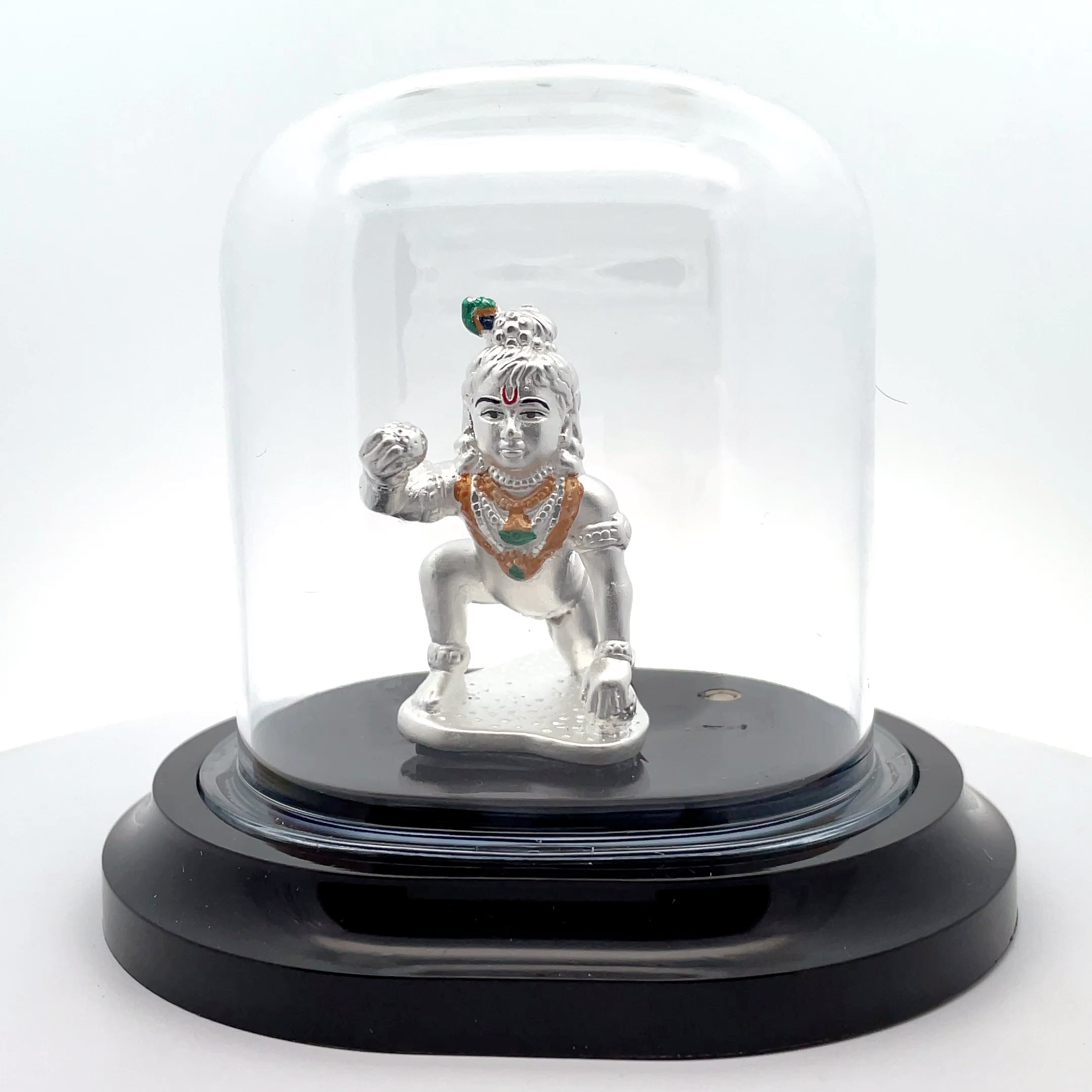 Elegant Silver Krishna Figurine Under Glass Dome