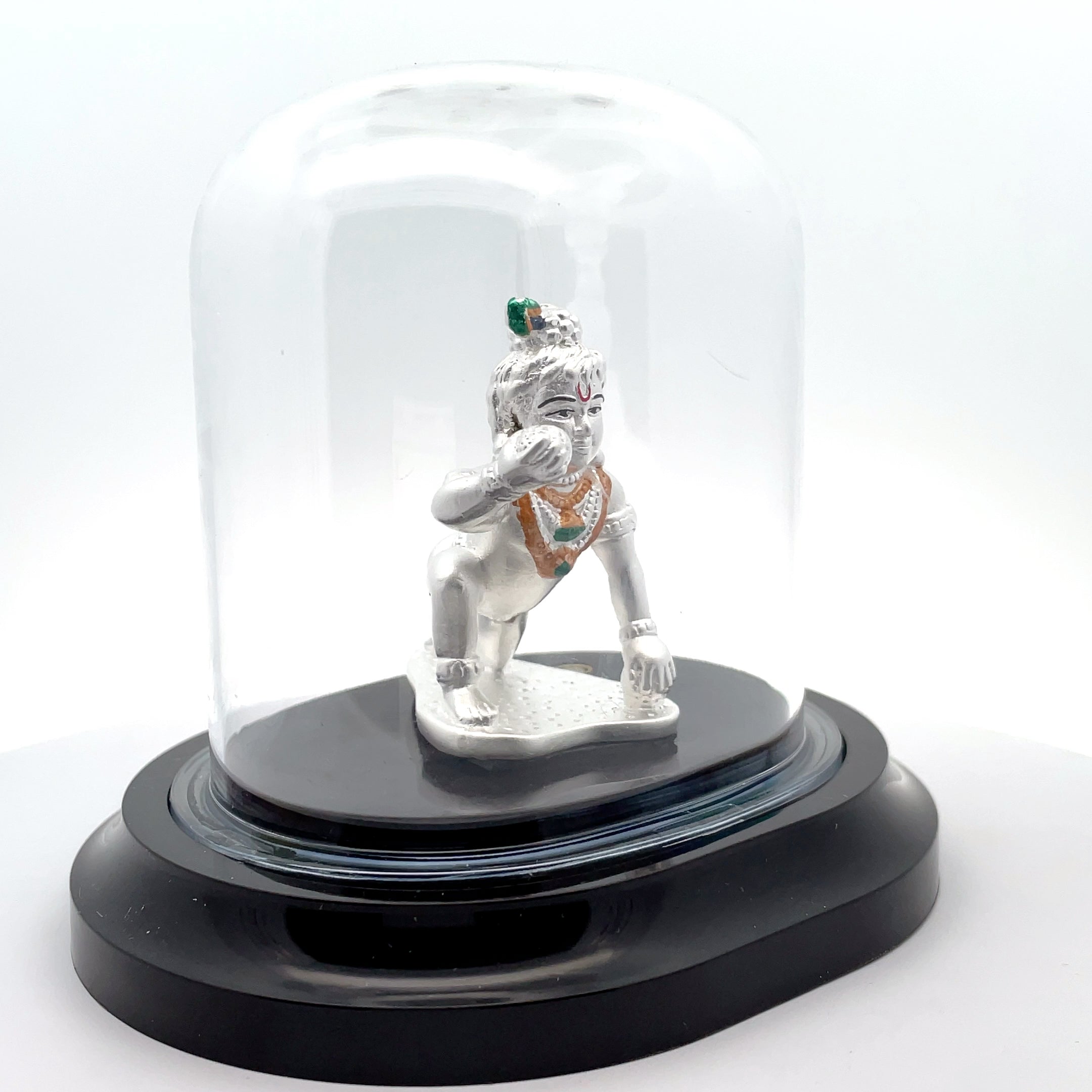 Elegant Silver Krishna Figurine Under Glass Dome