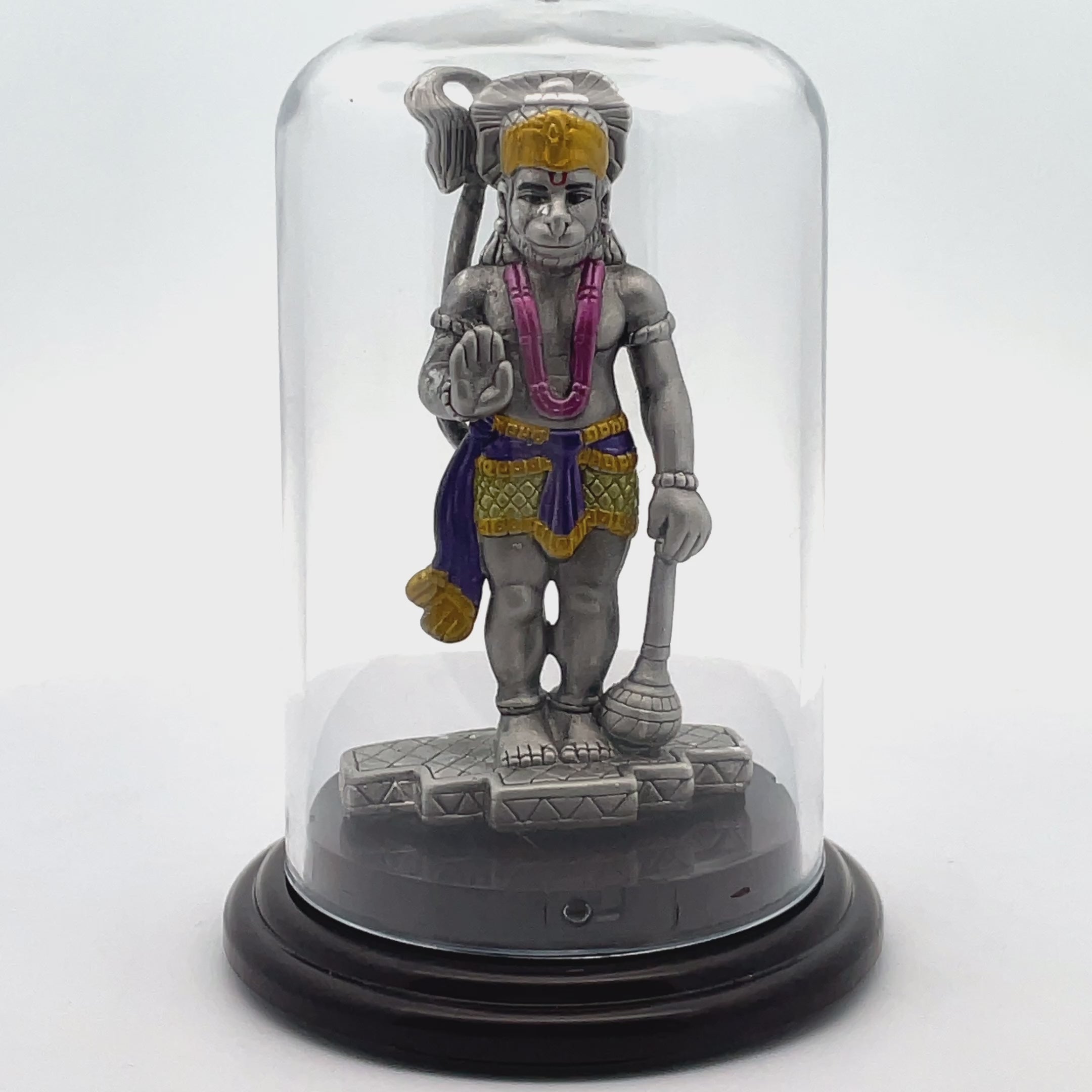 Colorful Hanuman Figurine Under Glass